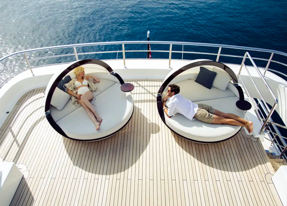 couple lounging on a yacht