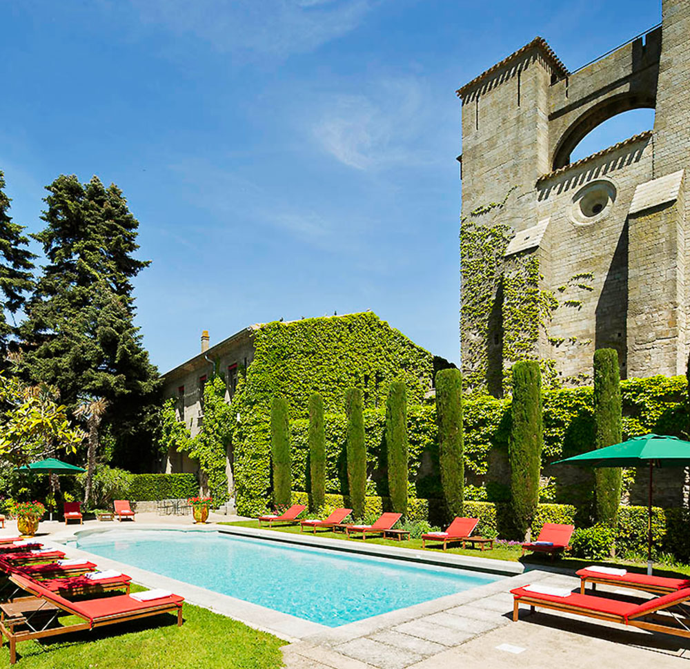 hotel pool with trees