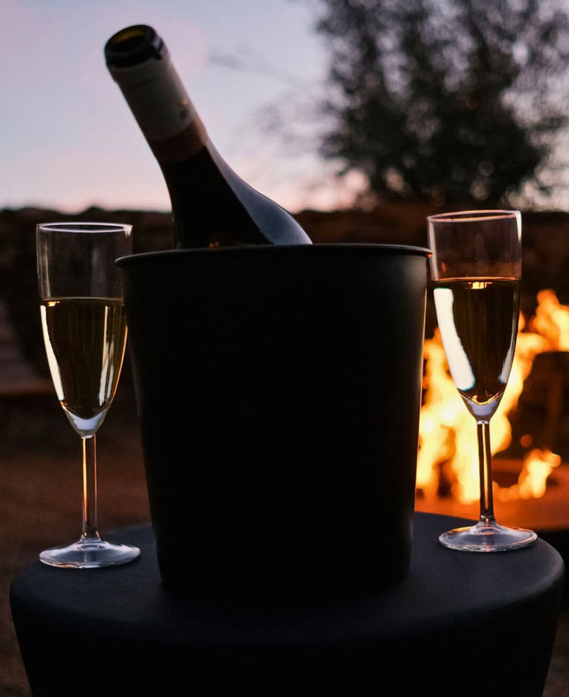 wine next to fire pit 